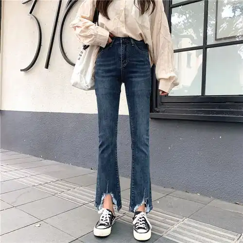 2019秋季新款韩版简约港风不规则弧形毛边弹力紧身牛仔裤女微喇裤ll