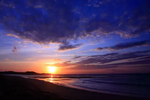 大海天空海面海景夕阳朝霞黄昏落日晚霞摄影图