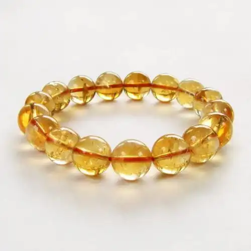 黄水晶在宝石界被称为水晶黄宝石,听说它有招财的寓意