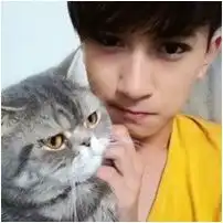 男孩抱着猫的头像真人男生面向左