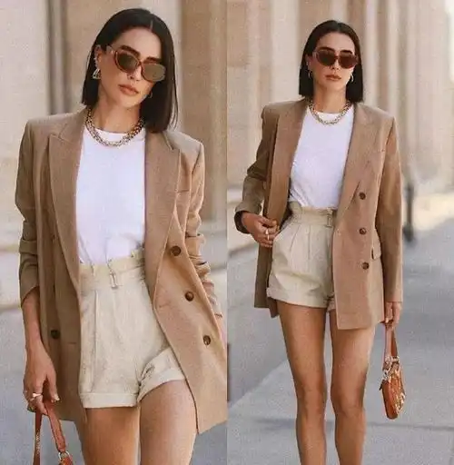 金莎这造型真把人看迷糊了,上衣像过冬,下衣又像过夏,太混乱了